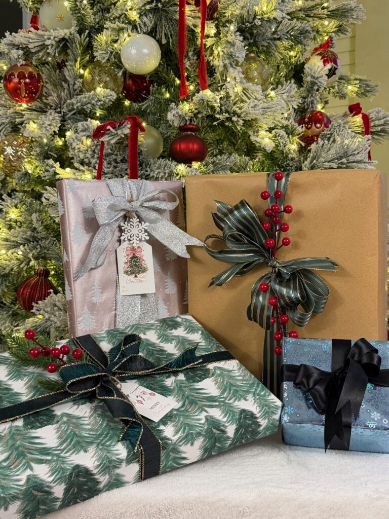Custom Christmas gift wrapping with greenery in Oklahoma City